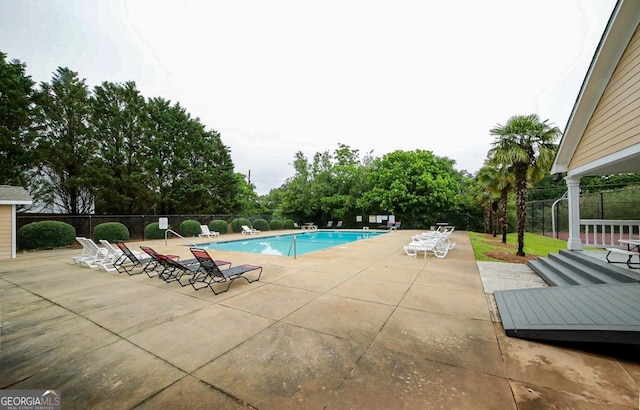 1010 Calls Creek Cir, Watkinsville, GA 30677 - community pool with a patio area