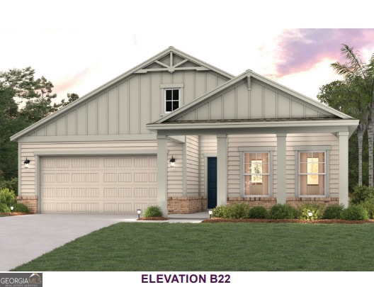 205 Park View Ln, Kingsland, GA 31548 - craftsman-style home with board and batten siding, driveway, brick siding, and an attached garage
