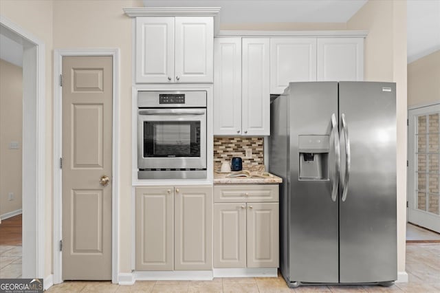 10 Wigwam Cir, Whitesburg, GA 30185 - kitchen with stainless steel appliances, white cabinets, and backsplash