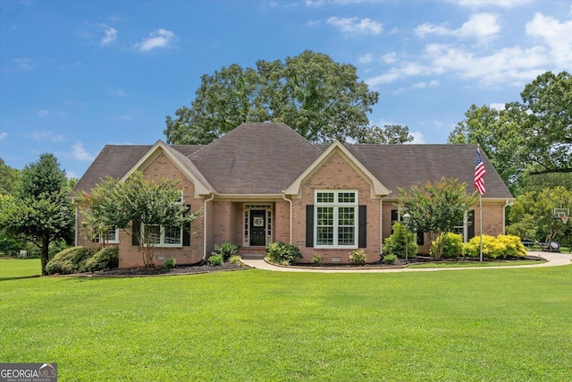 10 Wigwam Cir, Whitesburg, GA 30185 - view of front of home featuring brick siding, a front lawn, and roof with shingles