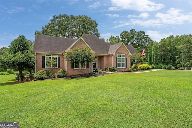 10 Wigwam Cir, Whitesburg, GA 30185 - view of front of home with brick siding, a front lawn, and a shingled roof
