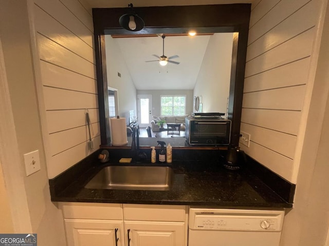 2165 Milledge Dr S Unit B6, Athens, GA 30605 - kitchen featuring white dishwasher, ceiling fan, dark stone counters, white cabinetry, and vaulted ceiling