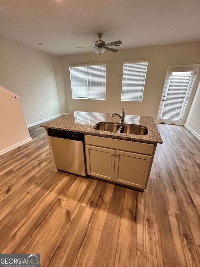2832 Saratoga Lake Vw, Decatur, GA 30034 - kitchen featuring stainless steel dishwasher, a sink, light wood-style floors, a center island with sink, and a ceiling fan