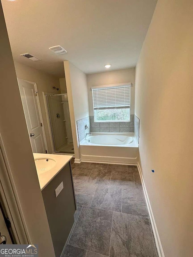 2832 Saratoga Lake Vw, Decatur, GA 30034 - full bath with a bath, a shower stall, vanity, and baseboards