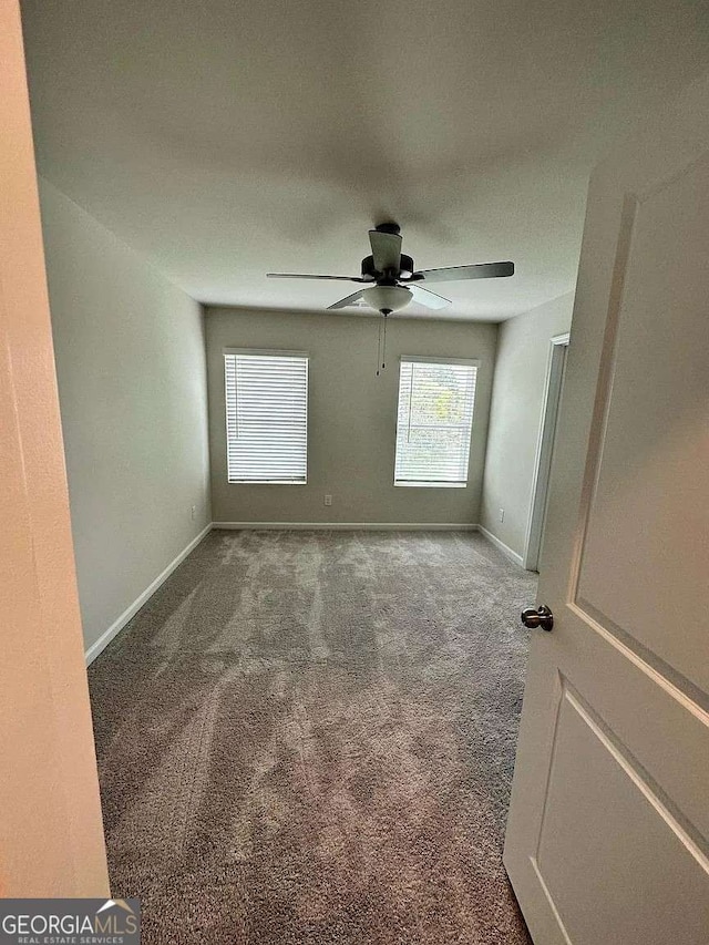 2832 Saratoga Lake Vw, Decatur, GA 30034 - spare room with carpet floors, ceiling fan, and baseboards