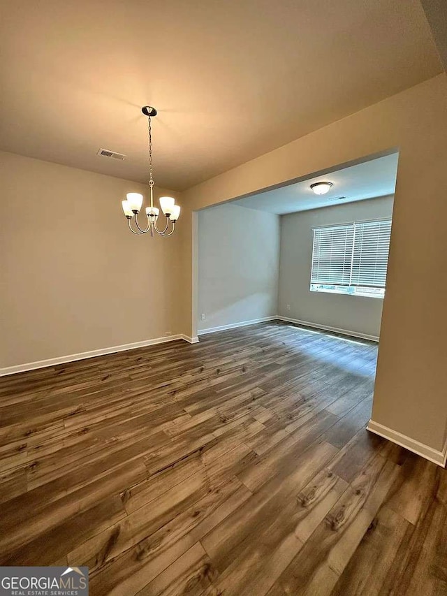 2832 Saratoga Lake Vw, Decatur, GA 30034 - spare room with a chandelier, dark wood-style flooring, and baseboards