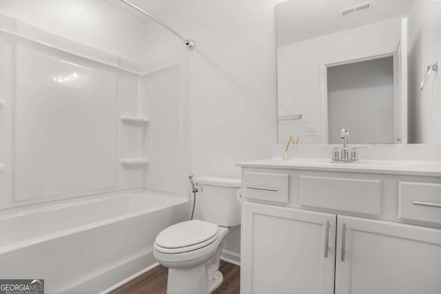 3848 Hester St, Duluth, GA 30097 - bathroom with wood finished floors, vanity, and bathtub / shower combination