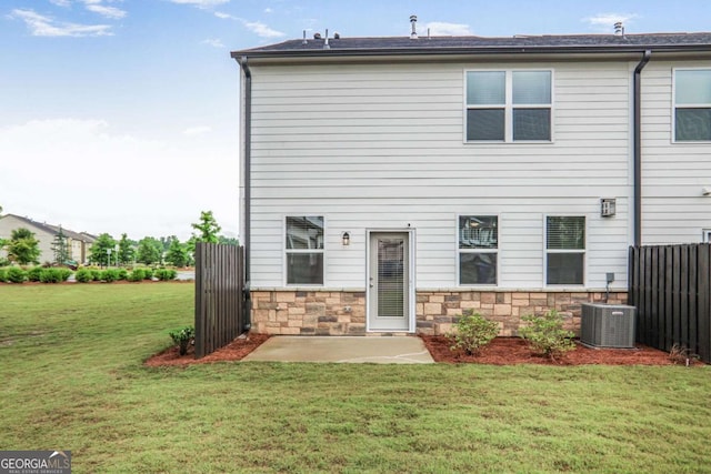 3848 Hester St, Duluth, GA 30097 - rear view of house featuring a patio and stone siding