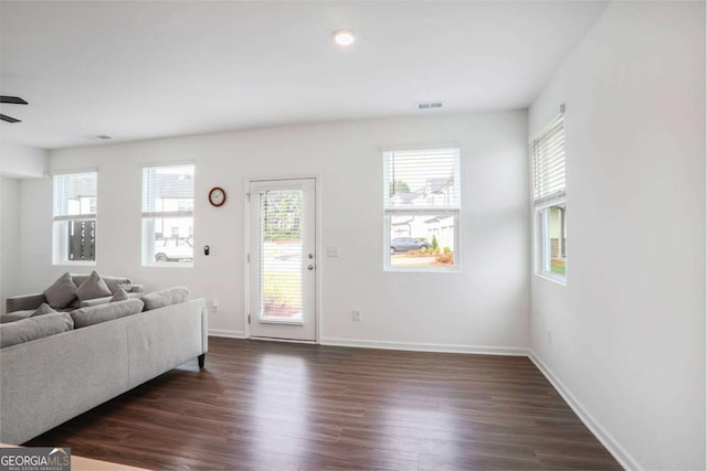 3848 Hester St, Duluth, GA 30097 - living area featuring dark wood finished floors and a ceiling fan