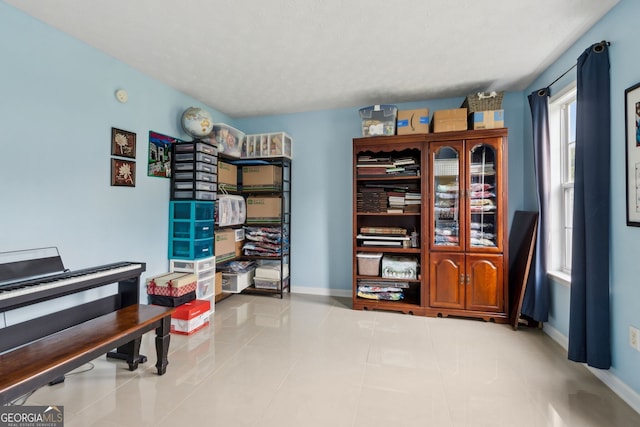 570 White Stag Ct, Suwanee, GA 30024 - living area with baseboards and tile patterned floors