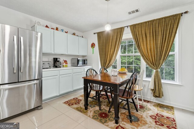 570 White Stag Ct, Suwanee, GA 30024 - dining area featuring light tile patterned floors