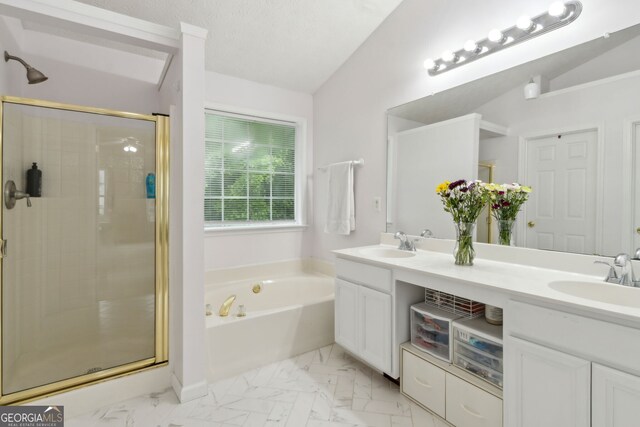 570 White Stag Ct, Suwanee, GA 30024 - bathroom featuring double vanity, a garden tub, a stall shower, marble look tiles, and lofted ceiling