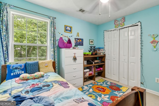 570 White Stag Ct, Suwanee, GA 30024 - carpeted bedroom with a closet and a ceiling fan
