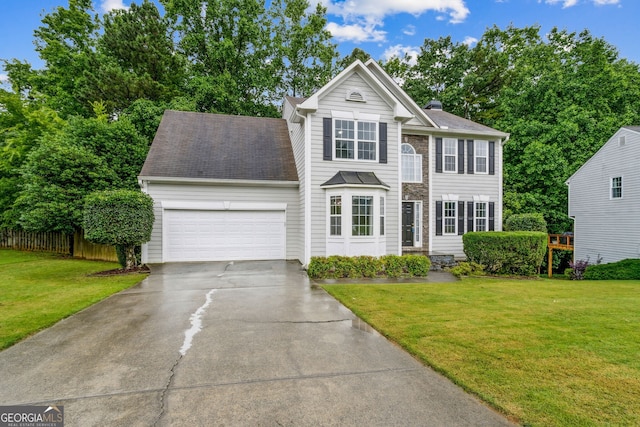570 White Stag Ct, Suwanee, GA 30024 - view of front of house with a garage, concrete driveway, and a chimney
