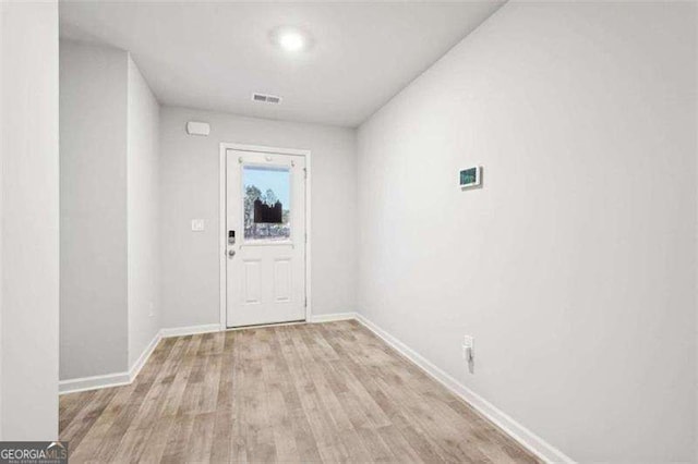 382 Daffodil Dr, Temple, GA 30179 - entryway featuring wood finished floors and baseboards