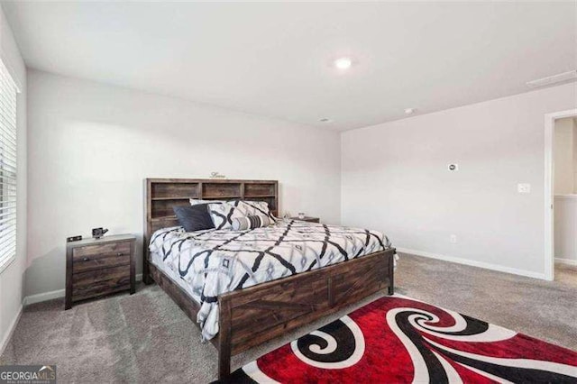 382 Daffodil Dr, Temple, GA 30179 - carpeted bedroom with baseboards