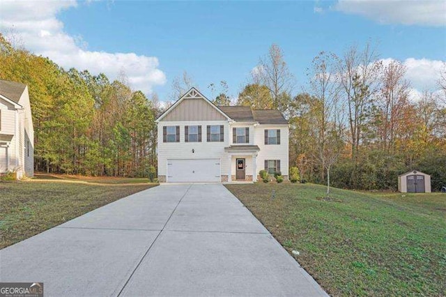 382 Daffodil Dr, Temple, GA 30179 - view of front facade with a storage unit, a garage, board and batten siding, concrete driveway, and a front yard