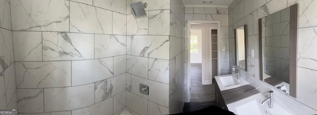 1408 Bethune St, Waycross, GA 31501 - bathroom with a tile shower, ornamental molding, and vanity