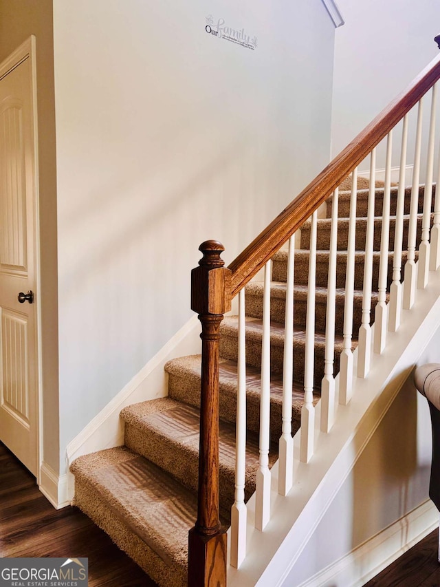 38 Lavender Ct, Dallas, GA 30132 - stairway with wood finished floors and baseboards