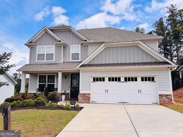 38 Lavender Ct, Dallas, GA 30132 - craftsman inspired home with brick siding, driveway, covered porch, board and batten siding, and a front yard