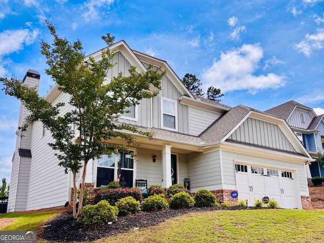 38 Lavender Ct, Dallas, GA 30132 - craftsman inspired home with board and batten siding, a garage, and brick siding