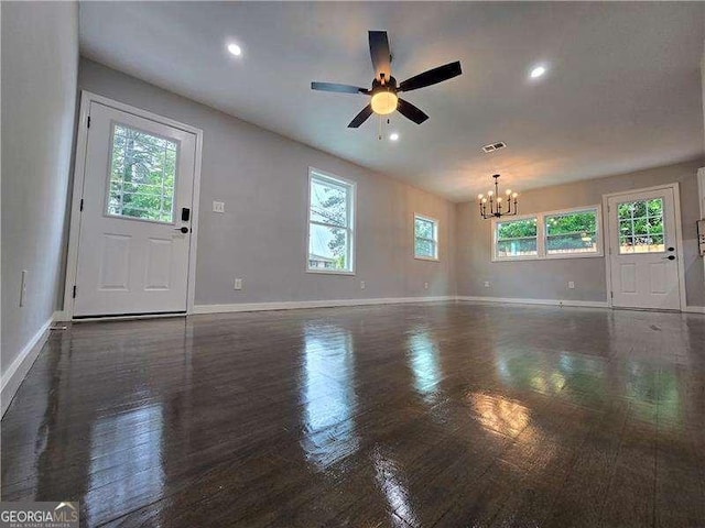 766 Longleaf Dr, Forest Park, GA 30297 - unfurnished living room featuring a chandelier, baseboards, wood finished floors, a ceiling fan, and recessed lighting