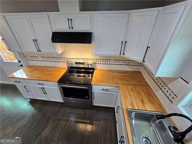 766 Longleaf Dr, Forest Park, GA 30297 - kitchen with wood counters, extractor fan, electric stove, dark wood-style flooring, and white cabinetry