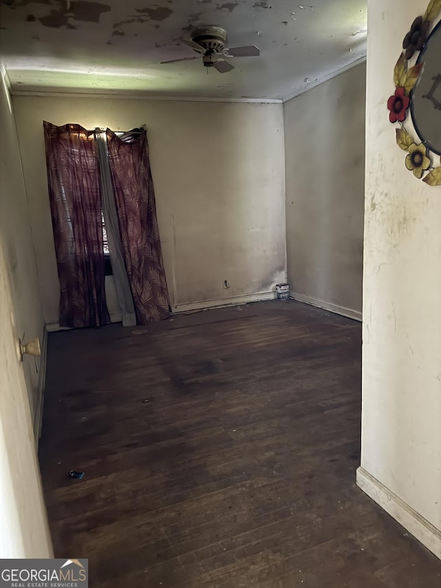 895 Ell Ct, Macon, GA 31206 - spare room with wood finished floors, ceiling fan, and crown molding