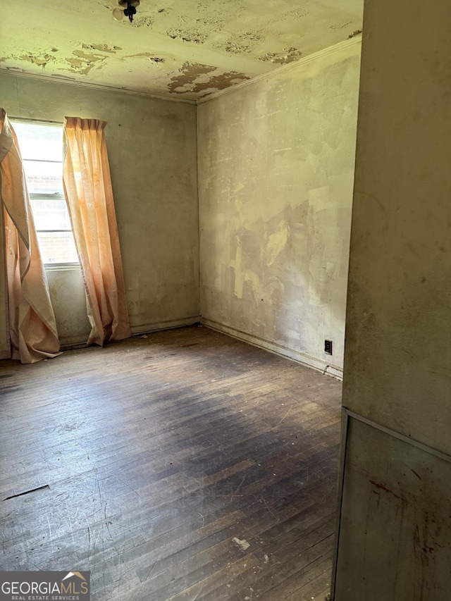 895 Ell Ct, Macon, GA 31206 - spare room featuring hardwood / wood-style floors