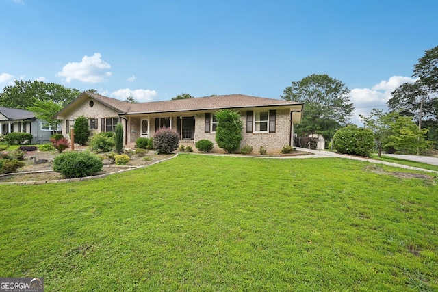 2676 Abington Dr, Snellville, GA 30078 - ranch-style home with a front lawn and brick siding