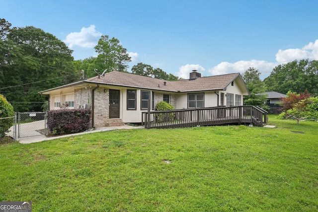 2676 Abington Dr, Snellville, GA 30078 - view of front of home with a deck, a chimney, brick siding, and a gate