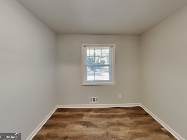7054 Chappell Cir, Atlanta, GA 30360 - spare room featuring dark wood-style floors and baseboards