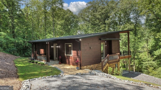 968 Hidden Valley Dr, Morganton, GA 30560 - chalet / cabin with a forest view and a porch