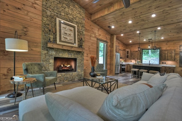 968 Hidden Valley Dr, Morganton, GA 30560 - living room with wood ceiling, dark wood finished floors, recessed lighting, a stone fireplace, and high vaulted ceiling