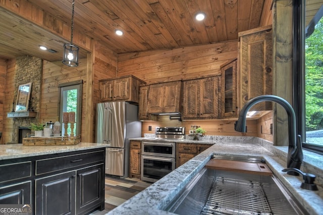 968 Hidden Valley Dr, Morganton, GA 30560 - kitchen with stainless steel appliances, wood ceiling, a sink, wooden walls, and recessed lighting