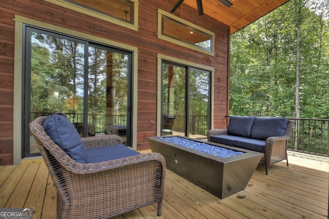 968 Hidden Valley Dr, Morganton, GA 30560 - wooden deck with ceiling fan and an outdoor living space with a fire pit