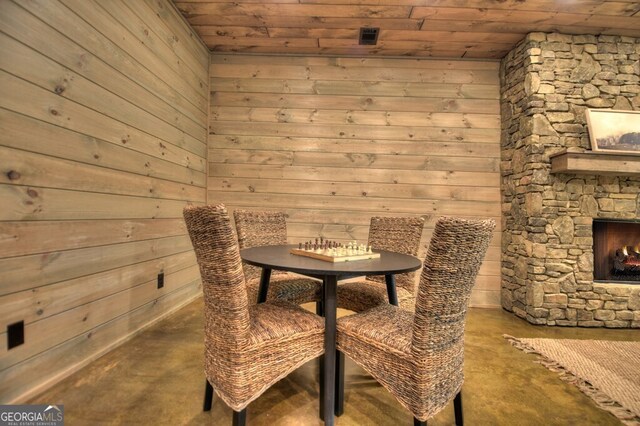 968 Hidden Valley Dr, Morganton, GA 30560 - dining room featuring concrete floors, wooden ceiling, and wooden walls