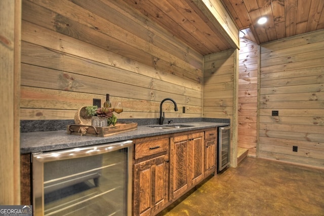 968 Hidden Valley Dr, Morganton, GA 30560 - bar with beverage cooler, wooden ceiling, wooden walls, a sink, and finished concrete flooring