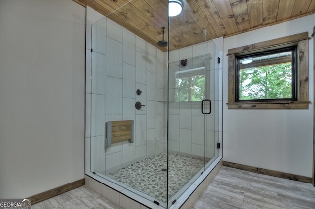 968 Hidden Valley Dr, Morganton, GA 30560 - full bathroom featuring a stall shower, wood finished floors, baseboards, and wood ceiling