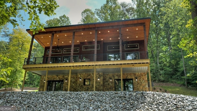 968 Hidden Valley Dr, Morganton, GA 30560 - rear view of house with stone siding and a wooden deck