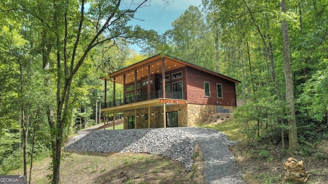 968 Hidden Valley Dr, Morganton, GA 30560 - view of front of home with a wooden deck and stone siding