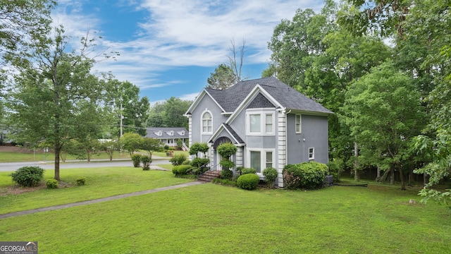 224 Rolling Oaks Dr, Rome, GA 30165 - view of front of property featuring stucco siding, a front lawn, and roof with shingles