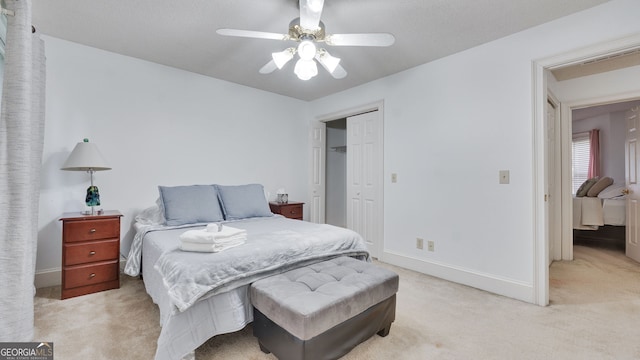 224 Rolling Oaks Dr, Rome, GA 30165 - bedroom featuring light colored carpet, a closet, baseboards, and ceiling fan