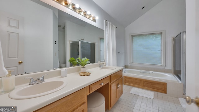 224 Rolling Oaks Dr, Rome, GA 30165 - bathroom with tile patterned flooring, vaulted ceiling, double vanity, a shower with shower door, and a garden tub