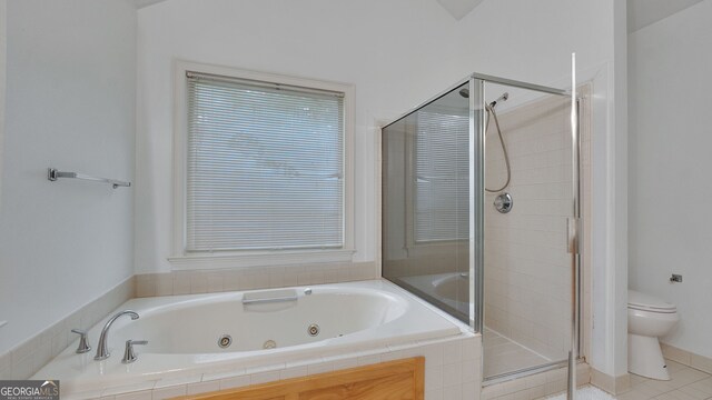 224 Rolling Oaks Dr, Rome, GA 30165 - full bathroom featuring toilet, a shower stall, a whirlpool tub, and tile patterned flooring