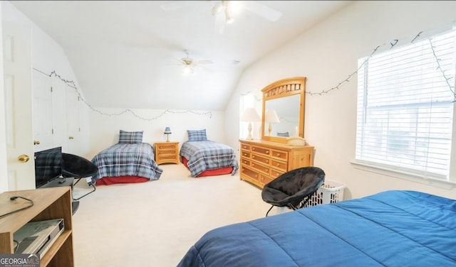 393 Arrowhead Trl, Eatonton, GA 31024 - bedroom featuring lofted ceiling, carpet flooring, and ceiling fan