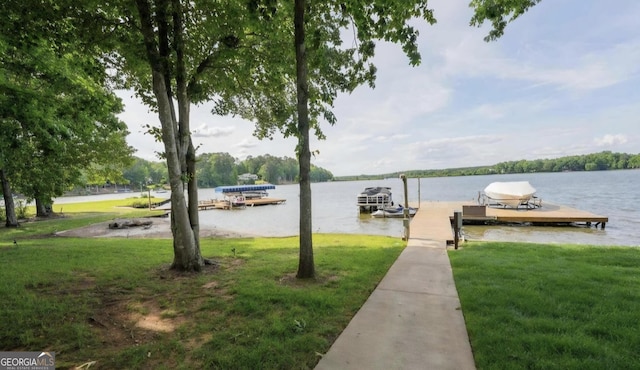 393 Arrowhead Trl, Eatonton, GA 31024 - dock with a lawn and a water view