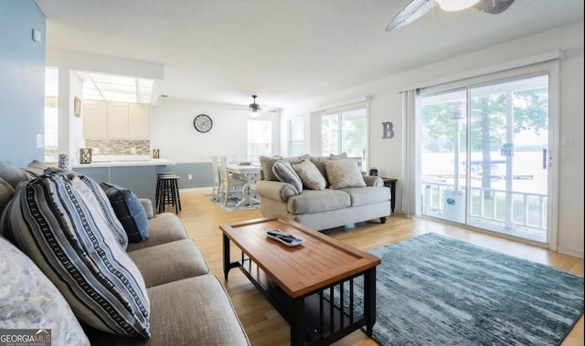 393 Arrowhead Trl, Eatonton, GA 31024 - living room with ceiling fan and light wood-style floors