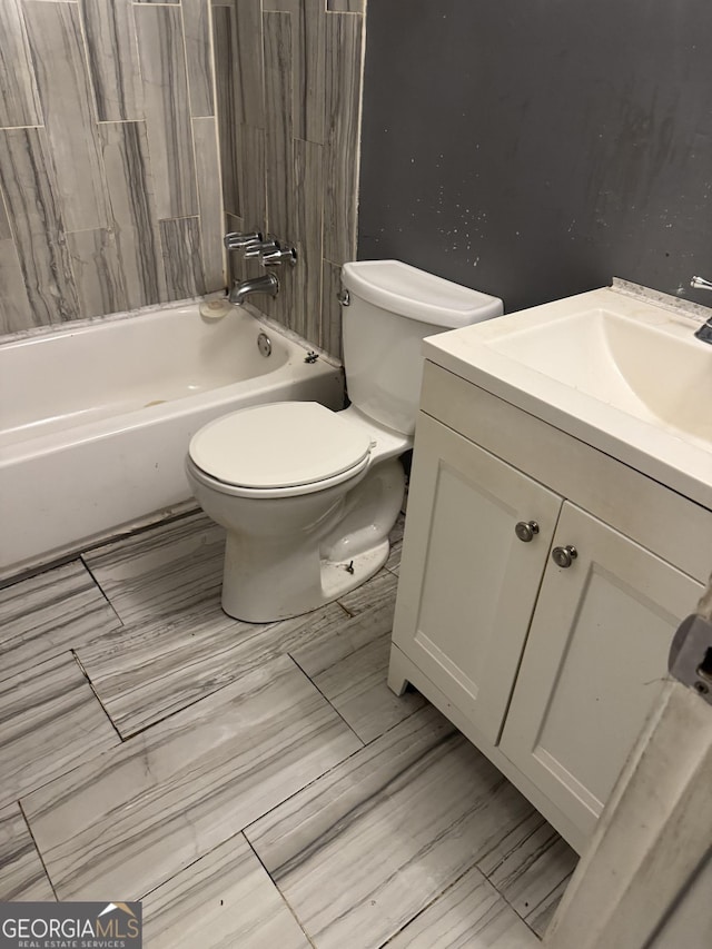 101 Sunset Ln, Newnan, GA 30263 - bathroom featuring vanity, toilet, and bathing tub / shower combination