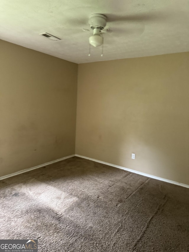 101 Sunset Ln, Newnan, GA 30263 - unfurnished room with ceiling fan, carpet flooring, and baseboards